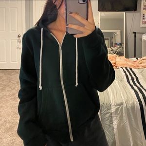green zip up hoodie